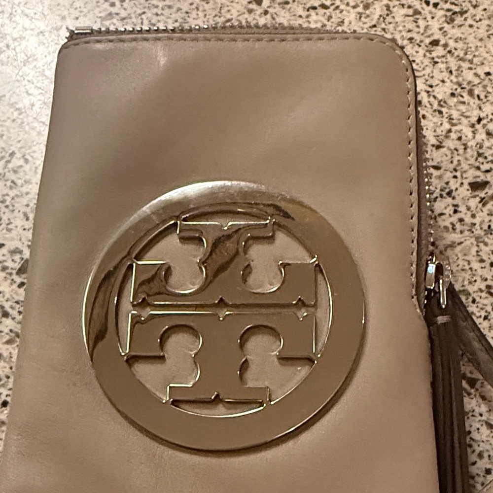 Tory Burch Beige cell phone wallet purse with silver Emblem